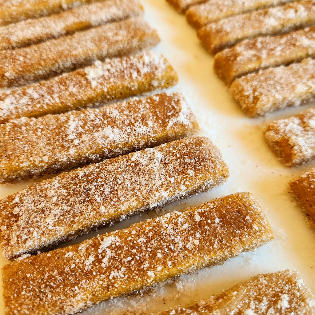 Pumpkin spice cookie sticks coated with cinnamon and sugar
