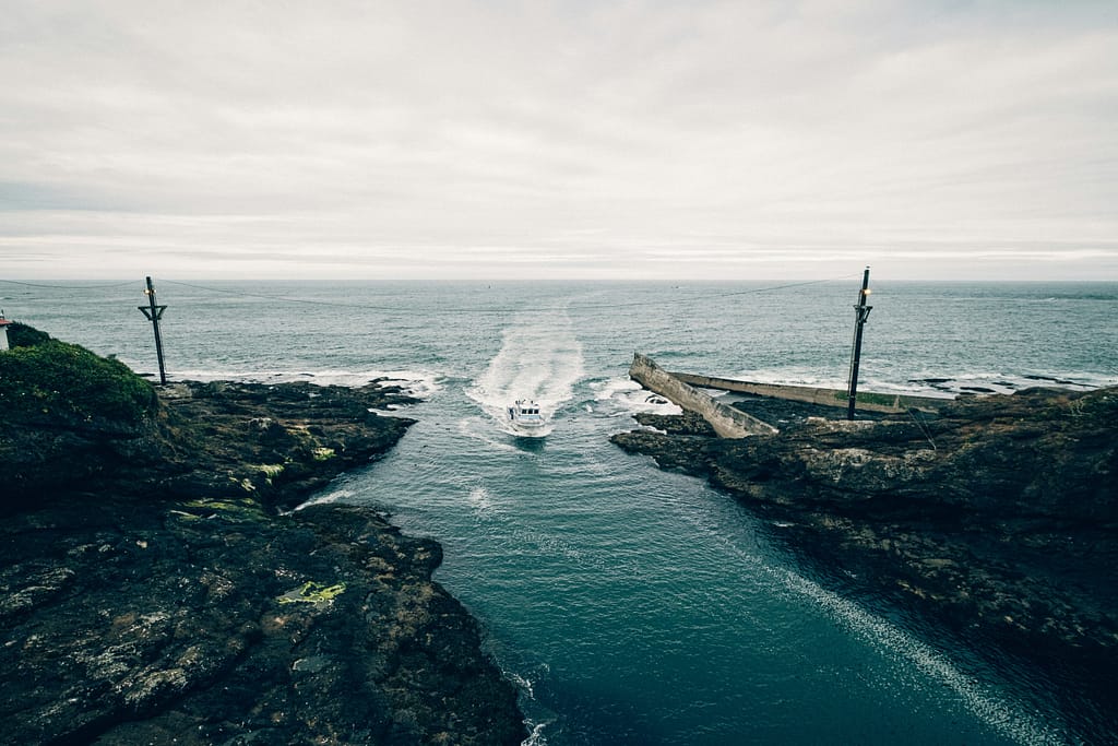 Boat coming in to the harbor in Depoe Bay, Oregon